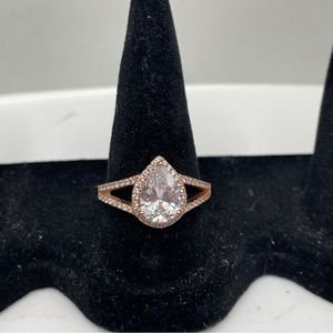 Rose Gold Tone And Clear Sparkling Stones Ring Size 8.75 Teardrop Style.